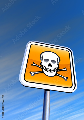 Danger skull sign against the evening sky