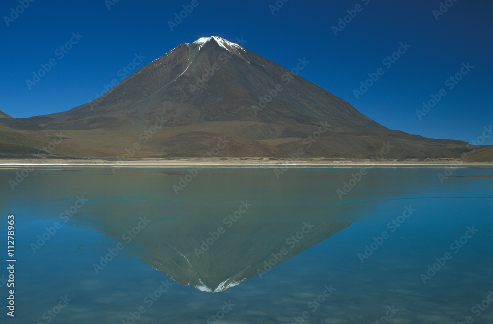 Fototapeta premium Snow Capped Volcano on the Bolivian Altiplano.