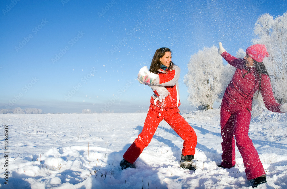 Winter Fun - Couple in Snowball Fight Stock Photo - Image of christmas, girls: 2