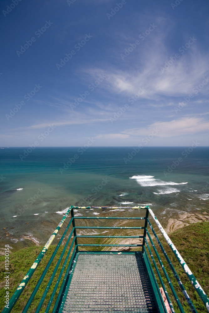 Obraz premium watch tower detail with ocean
