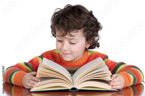 Принти на полотні Adorable happy boy studying