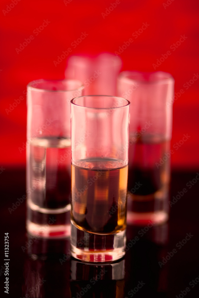 Shot glasses lined up ready to drink