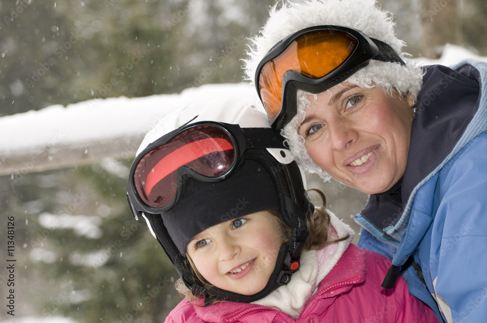 Mother and daughter on ski Mother and daughter on ski