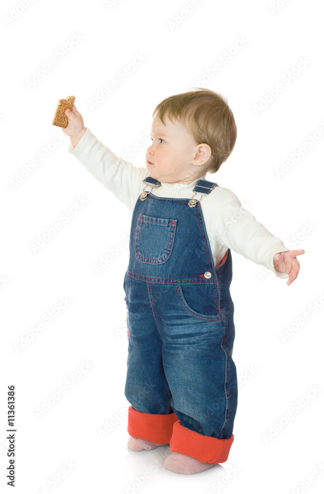 Small baby with cookie isolated Small baby with cookie isolated