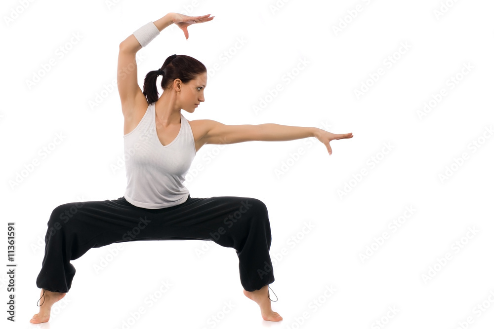 The girl is working out on a white background