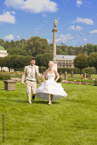 Bride and groom outdoors.