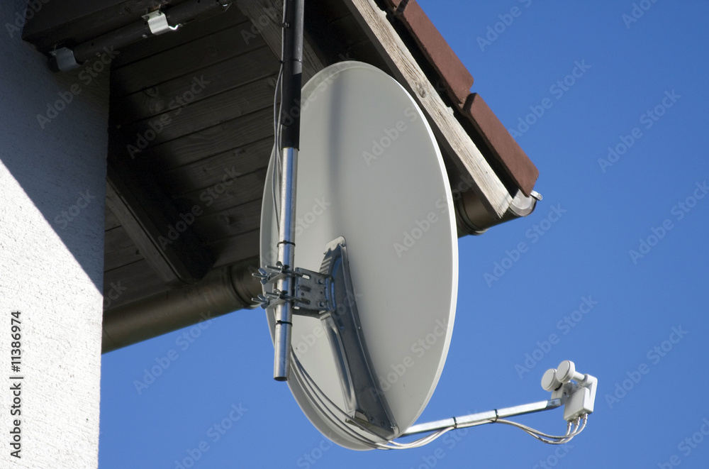 TV satellite dish on a house.