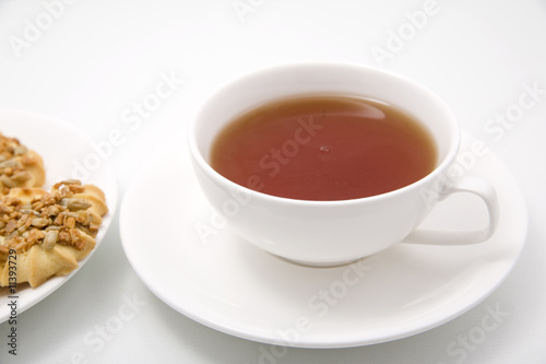 cup of tea and cookies isolated