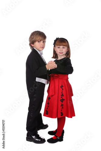 Canvas Print cute young children dancing togther in formal clothing