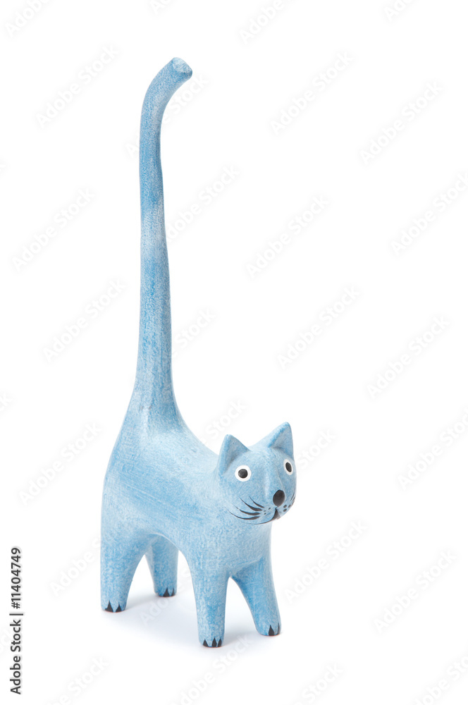statuette of cat with raised tail