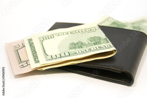 wallet with  dollars isolated on white background photo