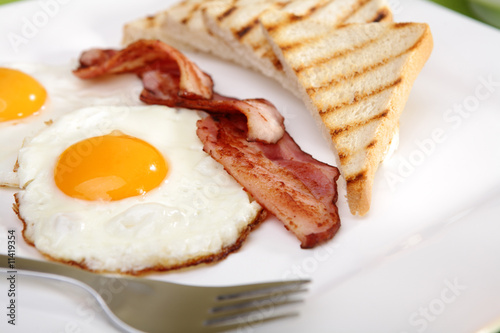 Breakfast - toasts, eggs, bacon