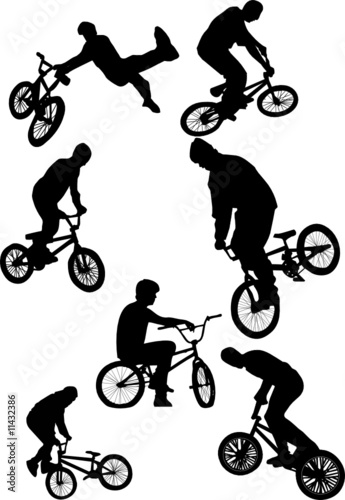 silhouette of bmx riders on a white background