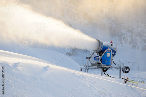 Snow cannon making snow at ski resort
