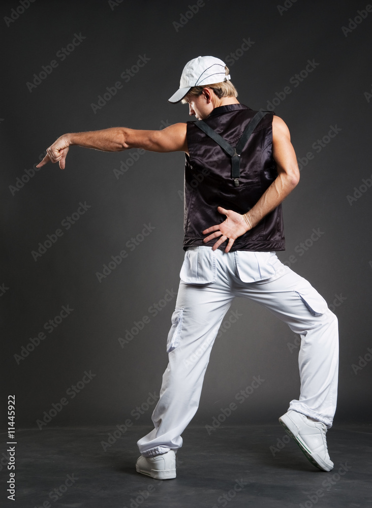hip-hop dancer in dance pointing