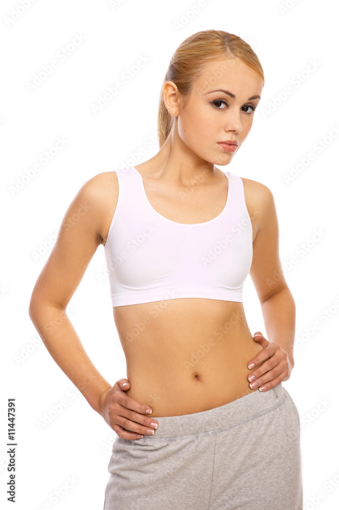 Portfait of Sporty beautiful girl standing on white Portfait of Sporty beautiful girl standing on white