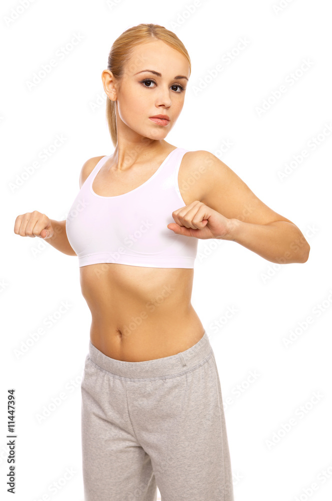 Portfait of Sporty beautiful girl standing on white Portfait of Sporty beautiful girl standing on white