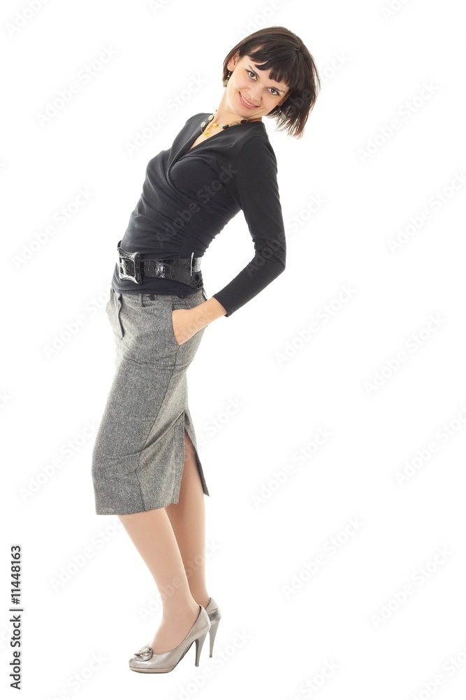 young woman standing against white background young woman standing against white background