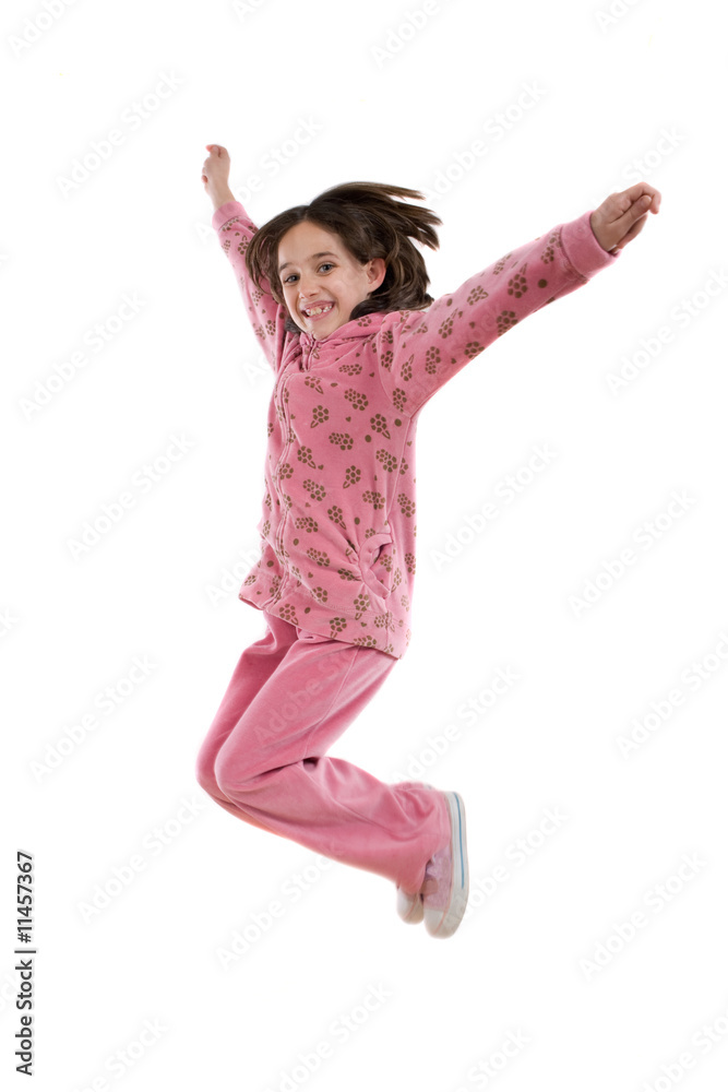 Joyful little girl jumping
