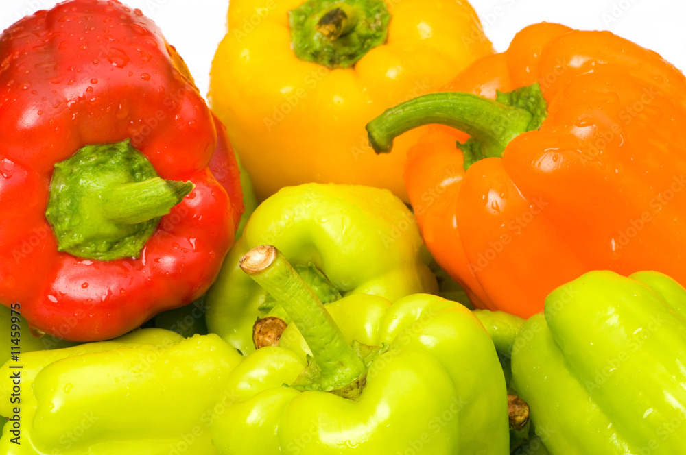 Bell peppers arranged at the market stand Bell peppers arranged at the market stand