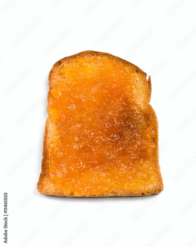 crispy white bread toast with orange jam spread isolated crispy white bread toast with orange jam spread isolated