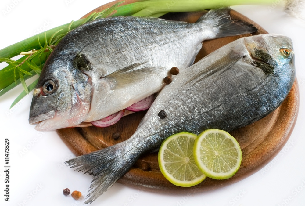 Fresh glitheads fish close up with vegetables Fresh glitheads fish close up with vegetables