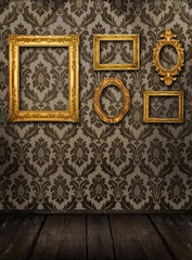 Gold frames, retro wallpaper, spotlights from above