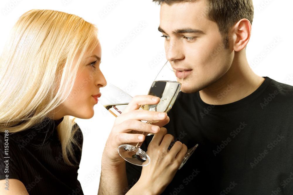 Isolated couple toasting with champagne Isolated couple toasting with champagne