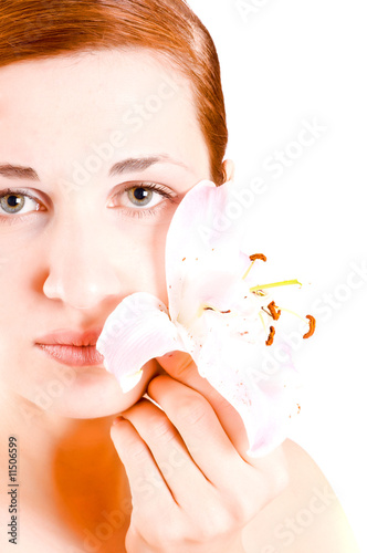Beautiful woman with lily flower
