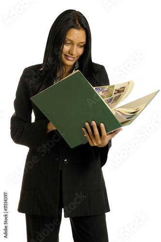 businesswoman is reading the big book