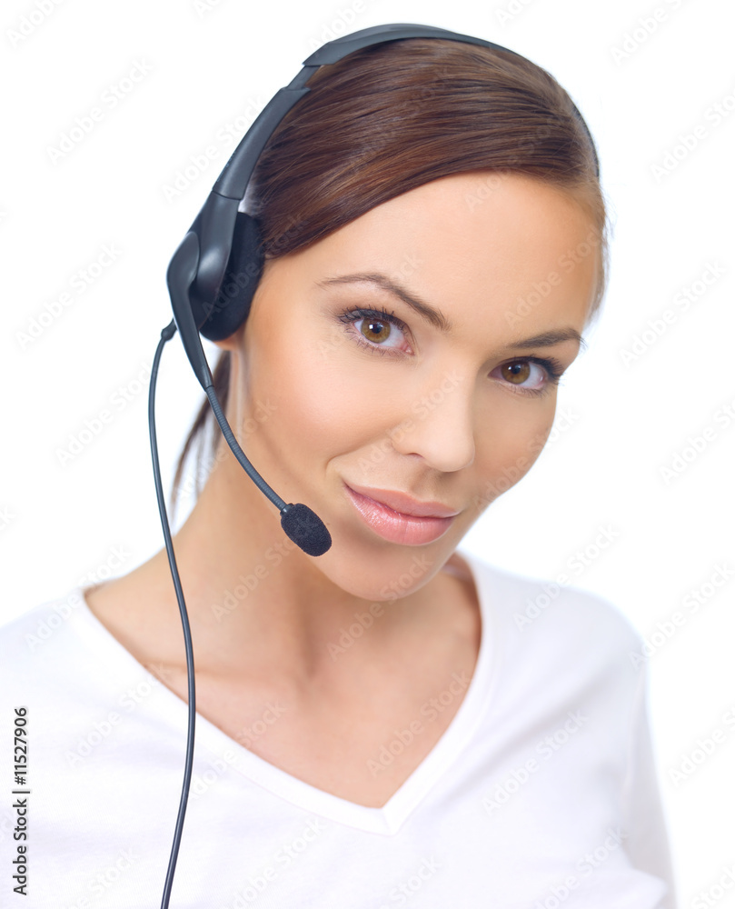 Beautiful girl is using headset, isolated on white Beautiful girl is using headset, isolated on white