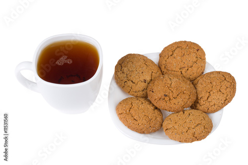 tea and five cookies on plate