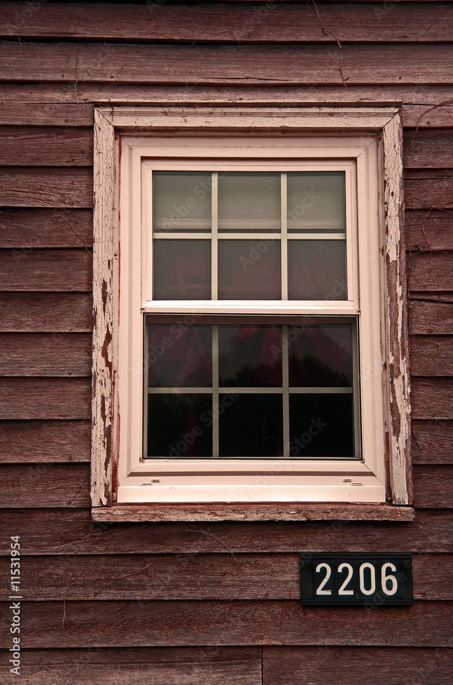 Window on a pioneer homestead in rural Iowa