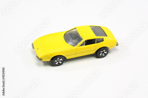 Yellow toy car.