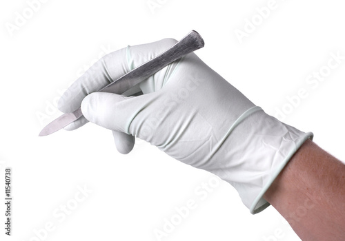 Hand holding scalpel