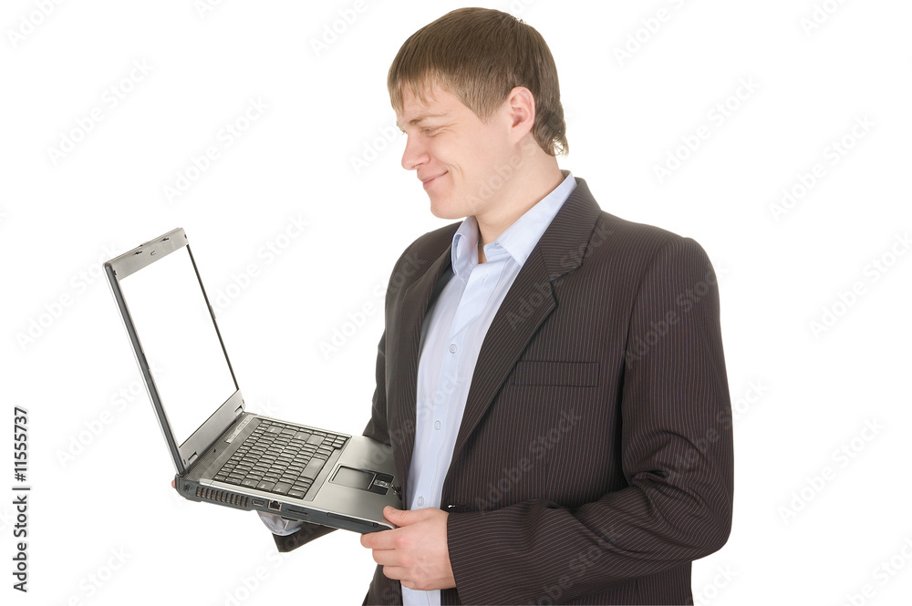 smiling businessman holding a laptop with white screen. smiling businessman holding a laptop with white screen.