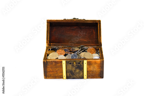 chest overfilled with coins isolated on white