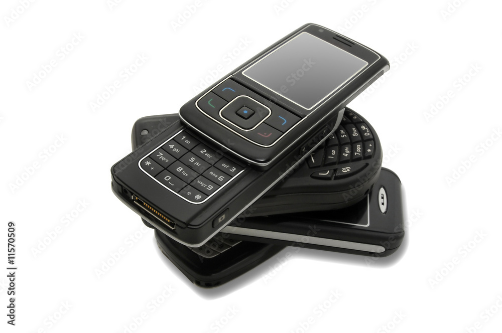 several cellphones isolated in white several cellphones isolated in white