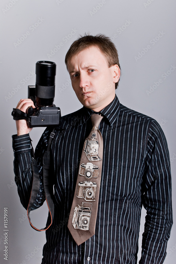 Naklejka premium Photographer with camera