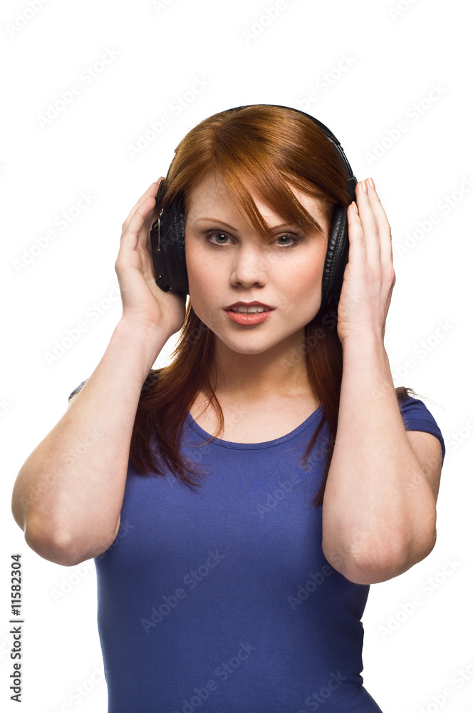 Beautiful young Redhead woman with headphones Beautiful young Redhead woman with headphones