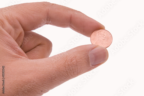 Coin held by two fingers