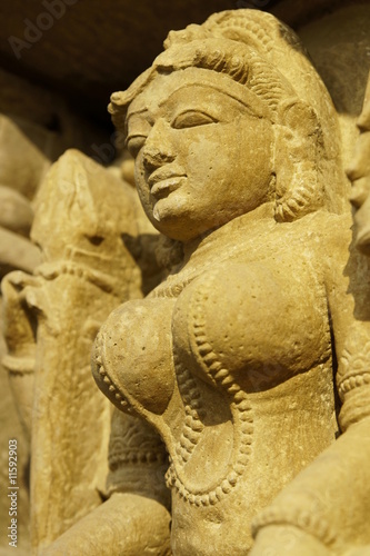 Religious figure on an ancient Hindu Temple at Khajuraho
