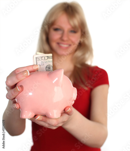 Woman holding out a piggy Bank