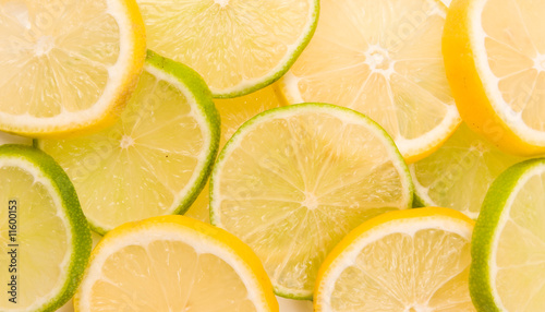 Lemon and lime slices abstract background