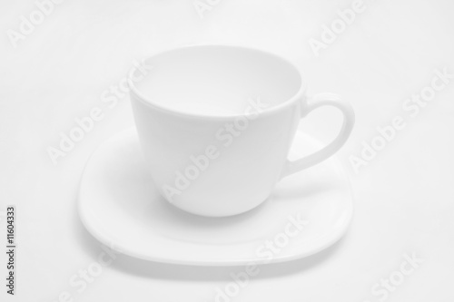 White cup on light background.