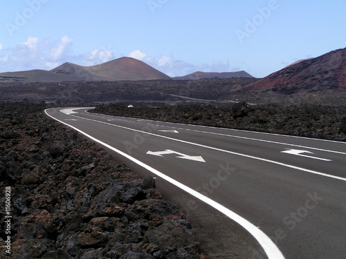 Express road through the lava rocks and volcanic mountains