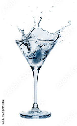 Splashing martini  toned in blue 