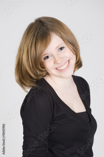 portrait of a beautiful smiling teen girl