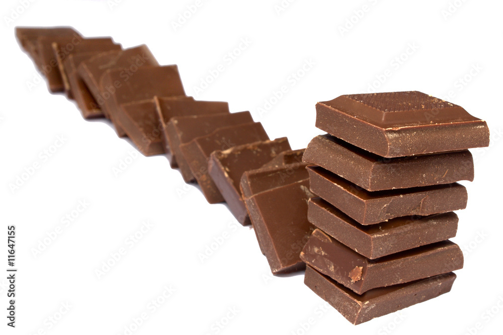 tower and line of chocolate fragments tower and line of chocolate fragments