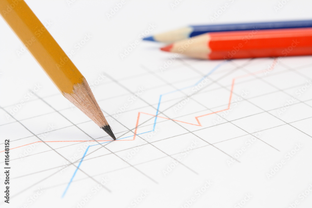 Various pensils on background with working drawing Various pensils on background with working drawing